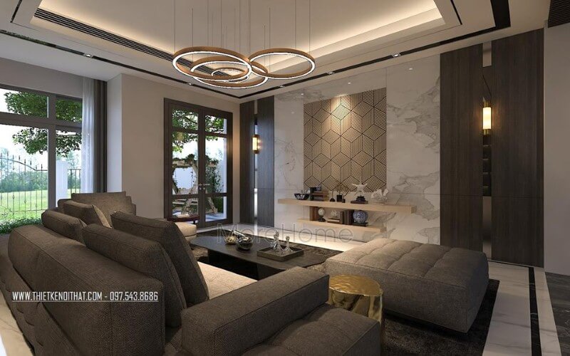 Trang trí không gian phòng khách rộng, hiện đại ấn tượng với ý tưởng sử dụng gam màu đối lập từ xám trắng cùng đồ nội thất cao cấp. Thiết kế nội thất phòng khách