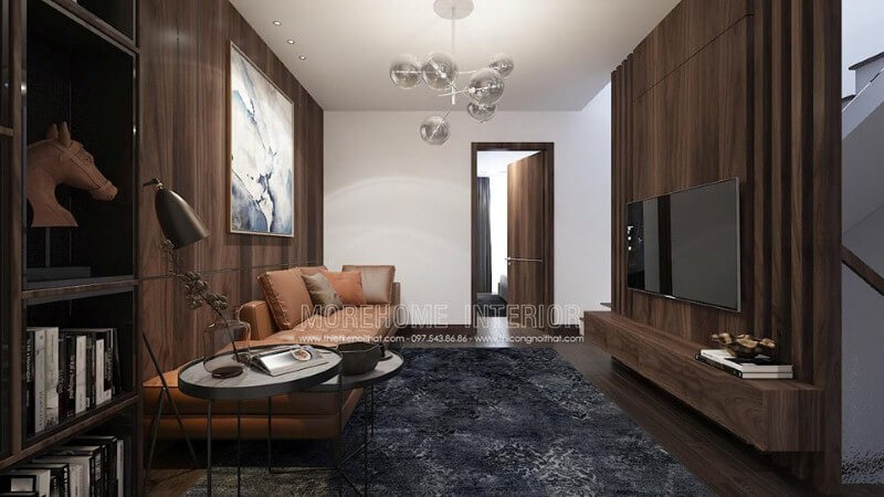 Điểm nhấn sofa da màu cam ấn tượng cho phòng khách hiện đại trang trí tường từ gỗ ốp tối màu. Gợi ý các mẫu bố trí phòng khách sang trọng và đẳng cấp