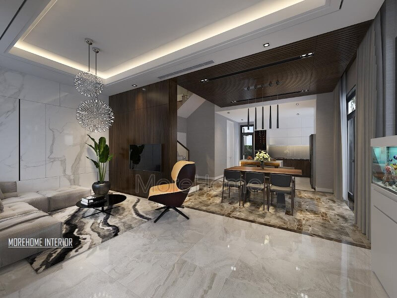 Điểm nhấn ấn tượng giữa gỗ ốp tường cùng đá lát sàn cao cấp tạo nên ánh nhìn hiện đại, độc đáo cho phòng khách liền bếp ăn. Thiết kế phòng khách tại Hà Nội
