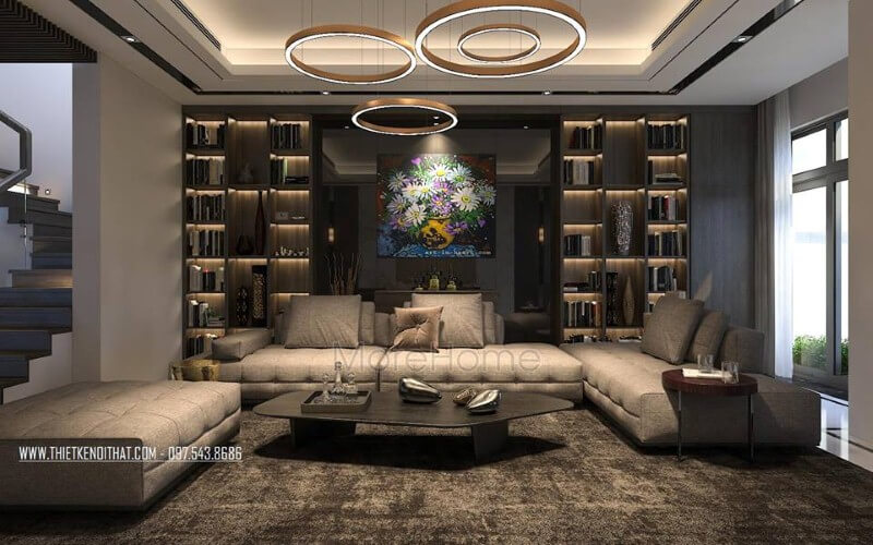 Thiết kế nội thất phòng khách hiện đại, sang trọng với bộ bàn ghế sofa lớn, kệ ốp tường, tranh treo tường. Mách bạn các mẫu bố trí phòng khách đẹp